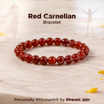 Red Carnelian bracelet on a light background with text indicating brand and creator.