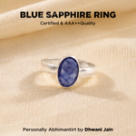Blue sapphire ring on a beige fabric background with text about certification and quality.