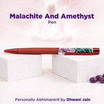 Pen with malachite and amethyst design on a white background