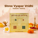 Shree Vyapar Vridhi Indrani Yantra with gold plating on a decorative background