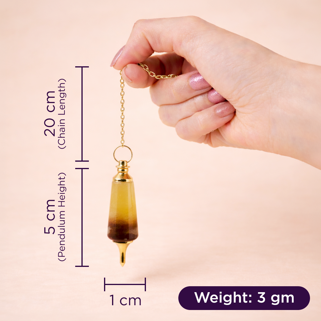 Hand holding a pendulum with measurements on a beige backgroundYellow Quartz Pendulum for Confidence, Prosperity & Dowsing - Abhimantrit