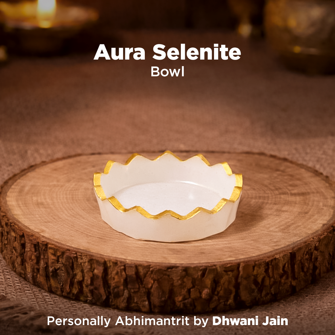 Aura Selenite bowl on a wooden surface with 'Aura Selenite' text above.