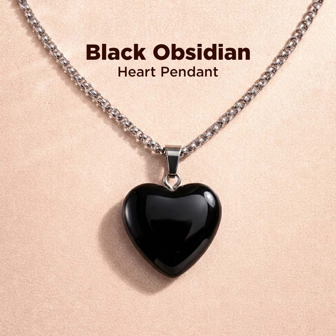 Black Obsidian heart pendant necklace on a beige background