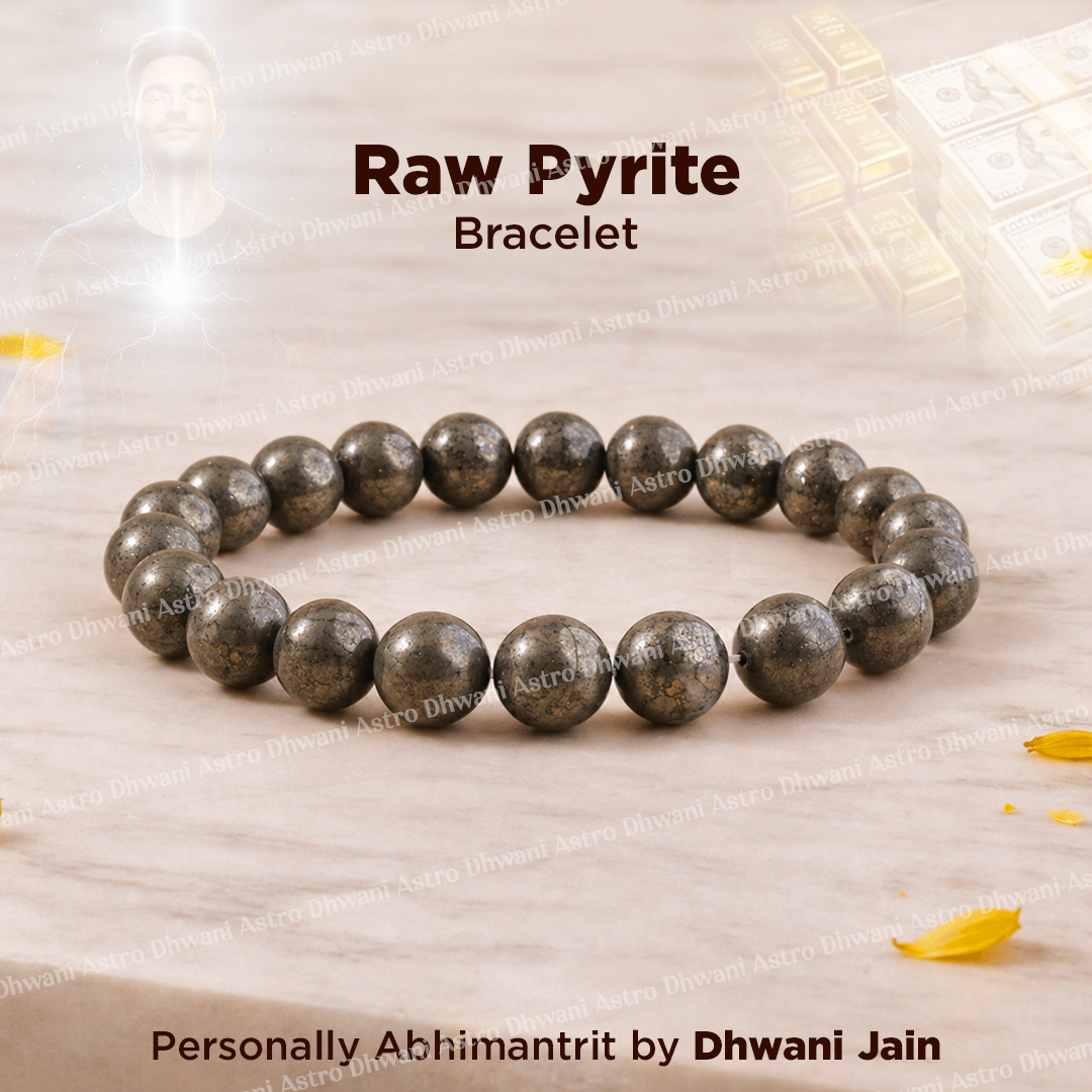 Raw pyrite bracelet on a textured surface with 'Dhwani Jain' branding.