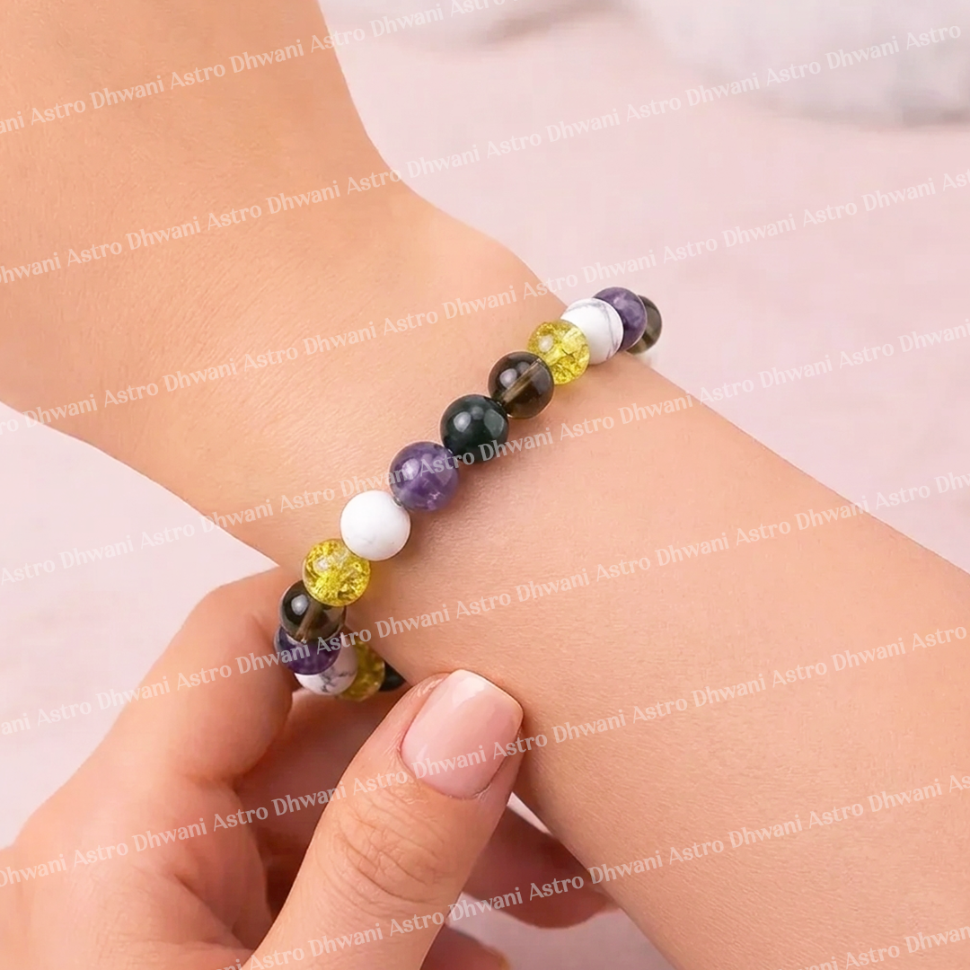 Beaded bracelet with multicolored beads on a wrist against a light background