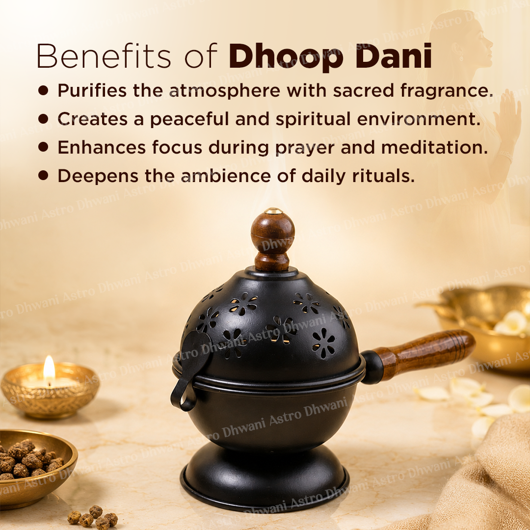 A black metal Dhoop Dani incense holder with wooden handles and lid knob, shown on a beige background with promotional text about its benefits. Decorative brass bowls, dried herbs, and a lit diya are placed around it.
