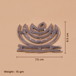 A silver-toned metal wall plaque or ornament with a stylized curved layered design, shown on a beige background with dimensions