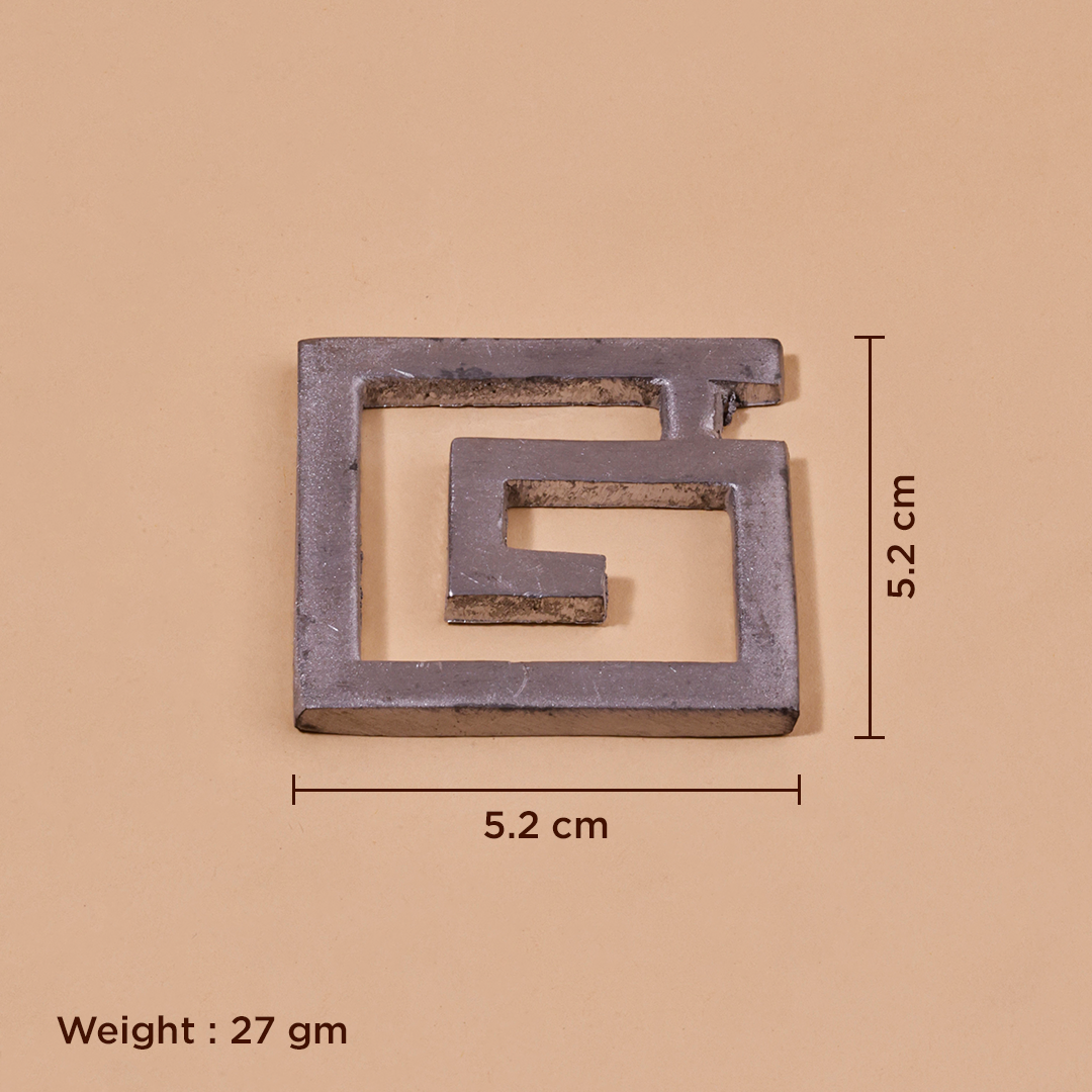 A square metal ornament with a geometric maze-like cutout design, shown on a beige background.Vastu Set for Home Office | Vastu Shastra Remedies | Prosperity, Protection & Positive Energy Symbols