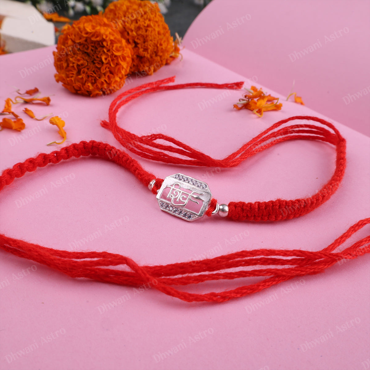 Vedic-inspired 925 Sterling Silver Shiv Rakhi with handcrafted red thread and premium festive presentation for brothers.