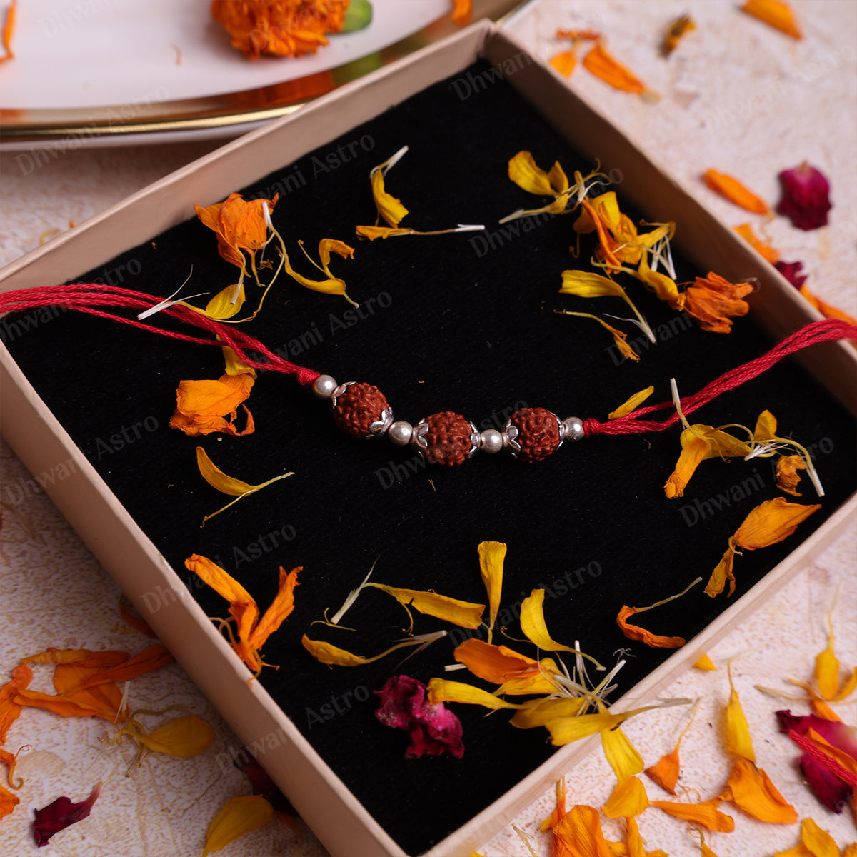 Traditional Raksha Bandhan Rakhi featuring 925 Sterling Silver and genuine Rudraksha beads, designed as a wearable spiritual bracelet.