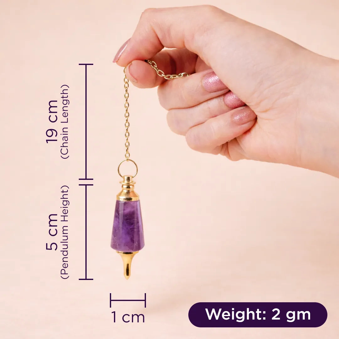 Hand holding a purple pendant with gold chain, showing measurements on a beige backgroundAmethyst Pendulum - Intuition & Healing Dowsing Tool