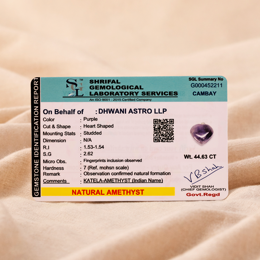 Shriful Gemological Laboratory Services identification report for a purple heart-shaped amethyst on a beige sand background.Amethyst Heart Pendant (Abhimantrit) for Peace & Clarity
