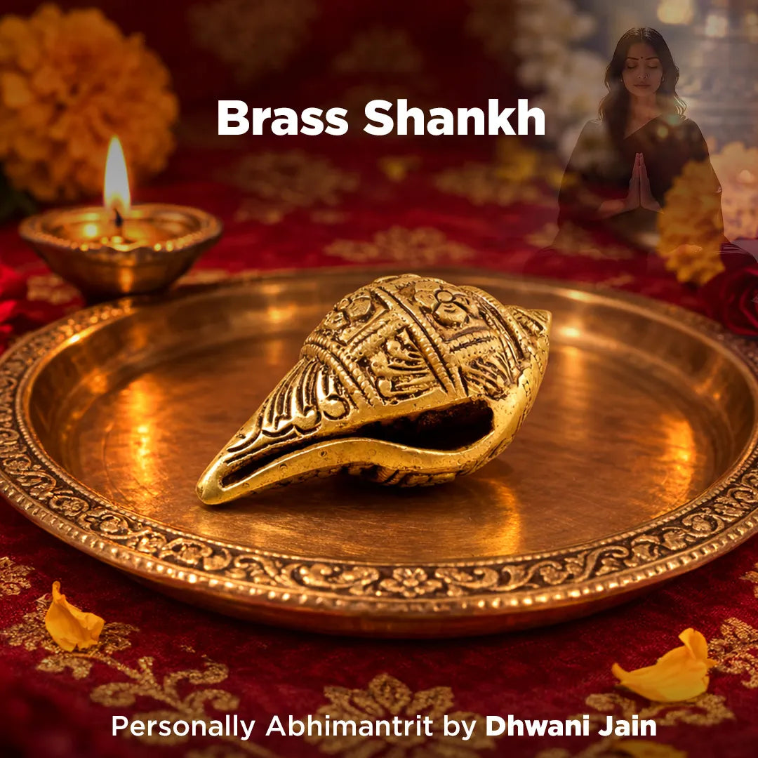 Decorative brass Shankh on a tray with Diwali decorations in the background