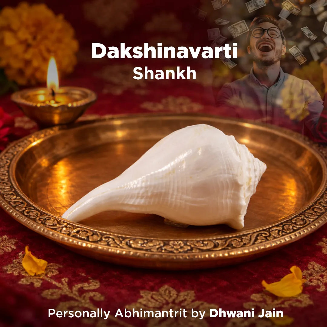 White conch shell on a gold plate with 'Dakshinavarti Shankh' text and decorative elements.