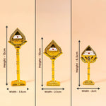 Three gold-colored decorative items with measurements on a beige background
