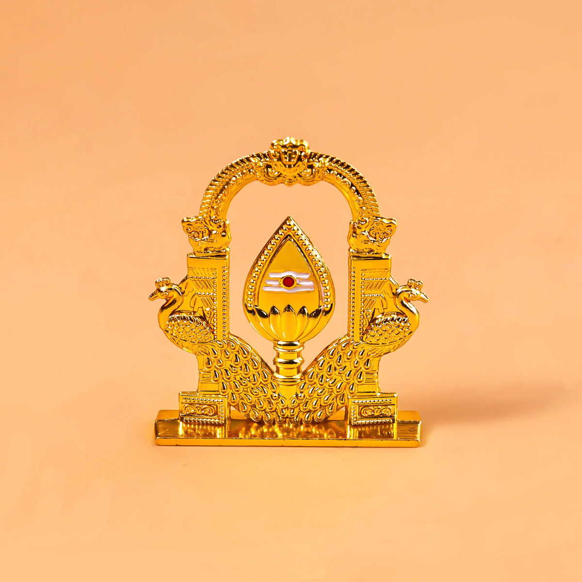 Decorative gold emblem with a central emblem on an orange background