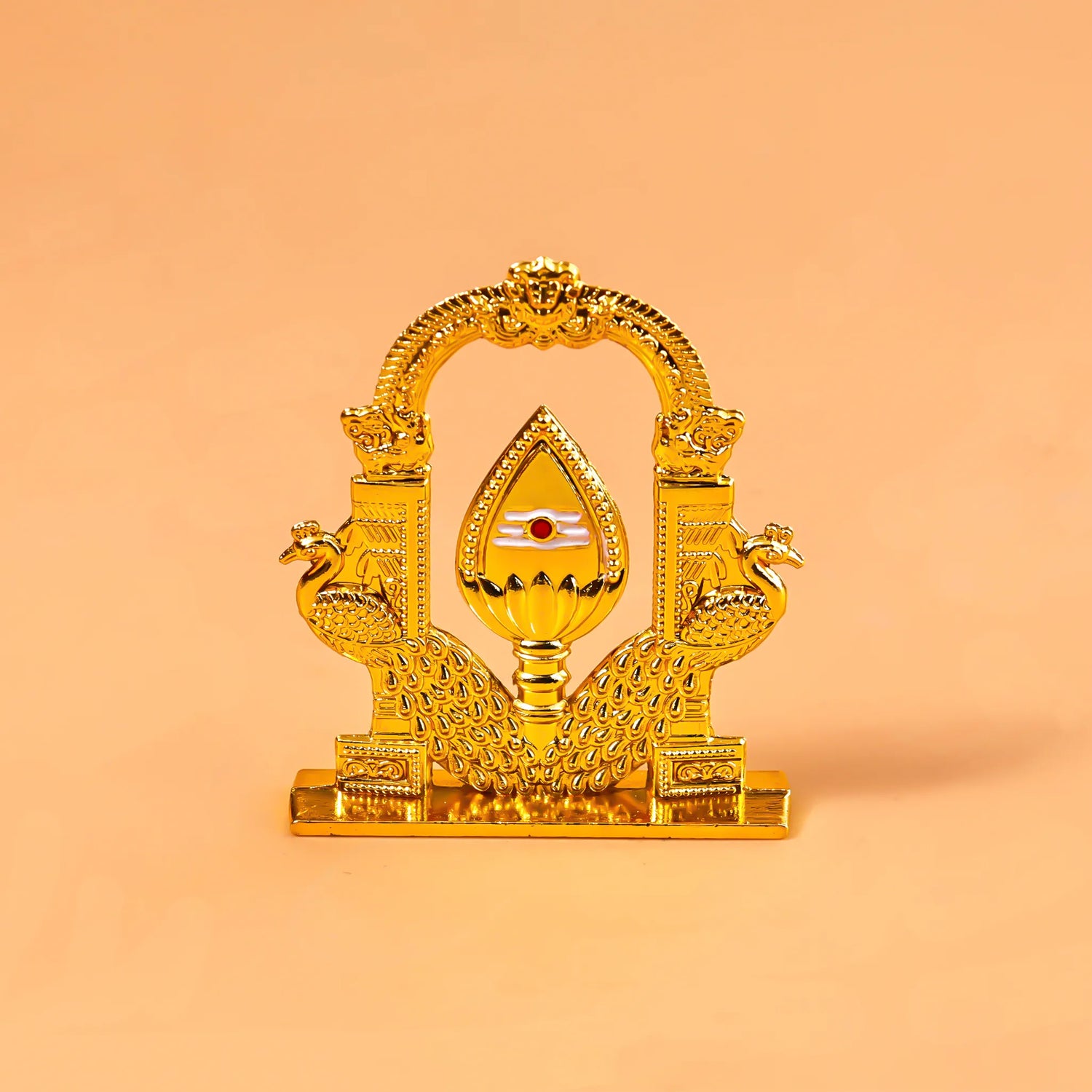 Decorative gold emblem with a central emblem on an orange background