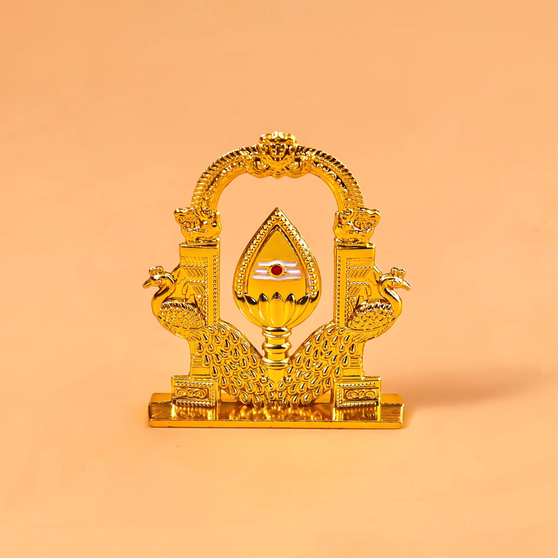Decorative gold emblem with a central emblem on an orange background