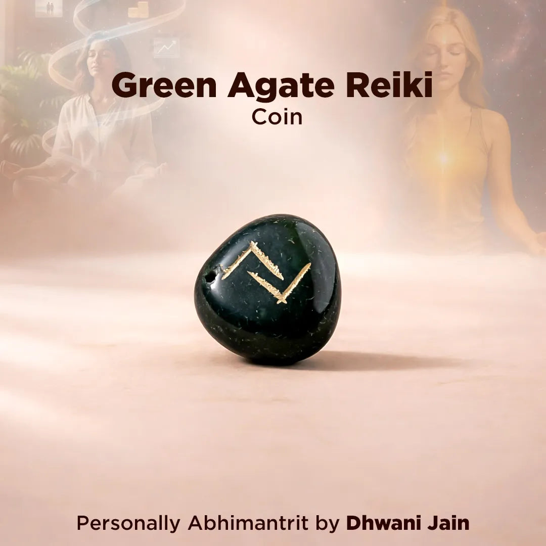 Green Agate Reiki Coin with blurred people in the background
