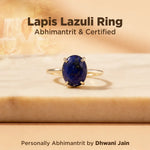 Lapis Lazuli ring on a wooden surface with text about certification and abhimantrit.