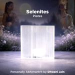 Two people in a field with a glowing crystal plate labeled 'Selenites Plates' by Dhwani Jain.