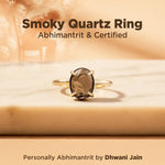Smoky Quartz Ring by Dhwani Jain on a wooden surface with a blurred background