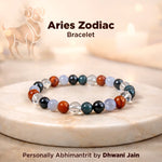 Aries Zodiac bracelet with colorful beads on a marble surface, featuring the Aries symbol.
