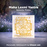 Maha Laxmi Yantra Selenite Plate with decorative text on a blurred nature background