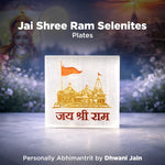 Plates with temple design and text on a blurred nature background