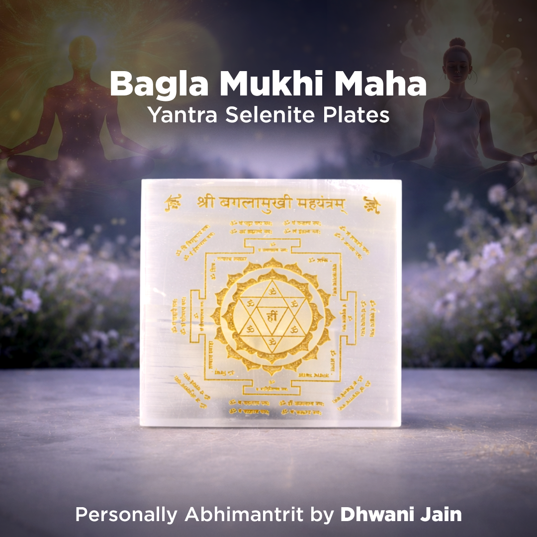 Selenite plates with Yantra design on a white background, surrounded by blurred figures and nature.