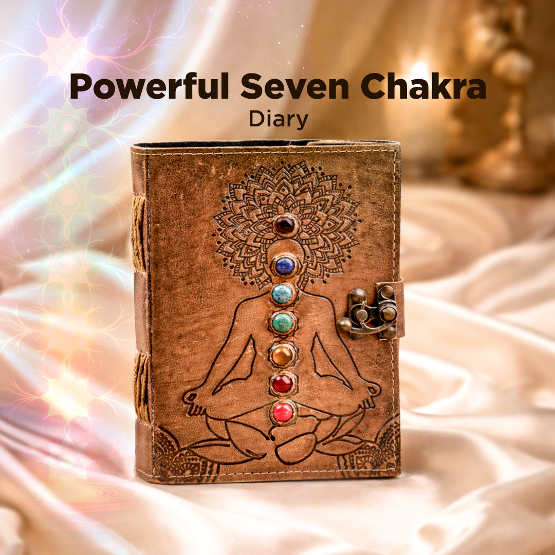 Diary with seven chakra design on a soft fabric background