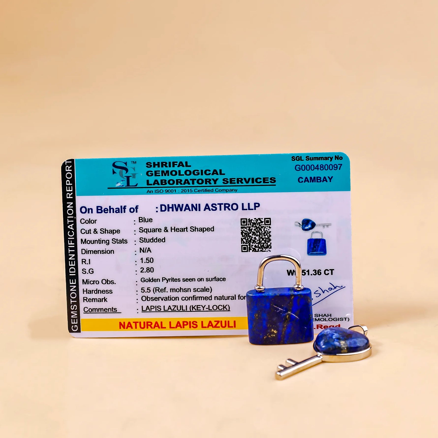Shriful Gemological Laboratory Services certificate for natural lapis lazuli with a lock and key on a beige backgroundLapis Lazuli Lock And Key Pendant - Abhimantrit & Certified