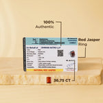 Red Jasper ring with a gemstone identification report on a beige background