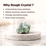 Rough crystal on a marble stand with text explaining reasons for using rough crystals.