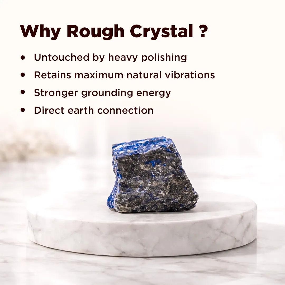 Rough crystal on a marble stand with text explaining benefits of using rough crystals.Rough Natural Lapis Lazuli Stone – Abhimantrit & Certified