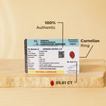 Certified carnelian ring with a gemological report on a beige background