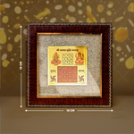 Decorative calendar with神像in a wooden frame on a textured background