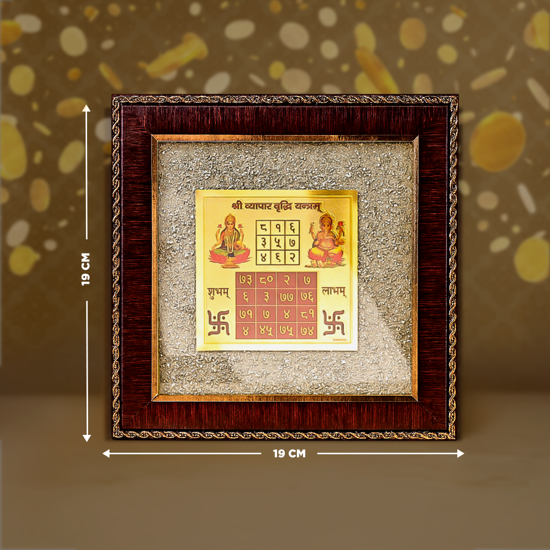 Decorative calendar with神像in a wooden frame on a textured backgroundVyapar Vridhi Yantra on Pyrite Frame - Business Growth & Prosperity Yantra