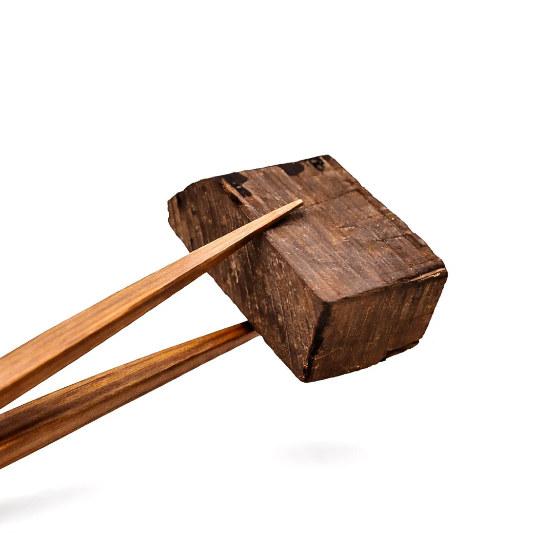 Wooden mallet with wooden handle on a white backgroundAgar Root – Fragrance, Calm Energy & Spiritual Purification Remedy