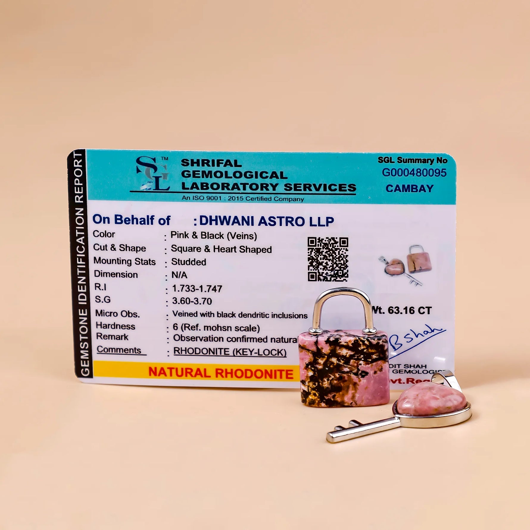 Shriful Gemological Laboratory Services identification report for a natural rhodonite stone on a beige background.Rhodonite Lock And Key Pendant - Abhimantrit & Certified