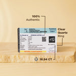 Clear Quartz ring with certification label on a beige background