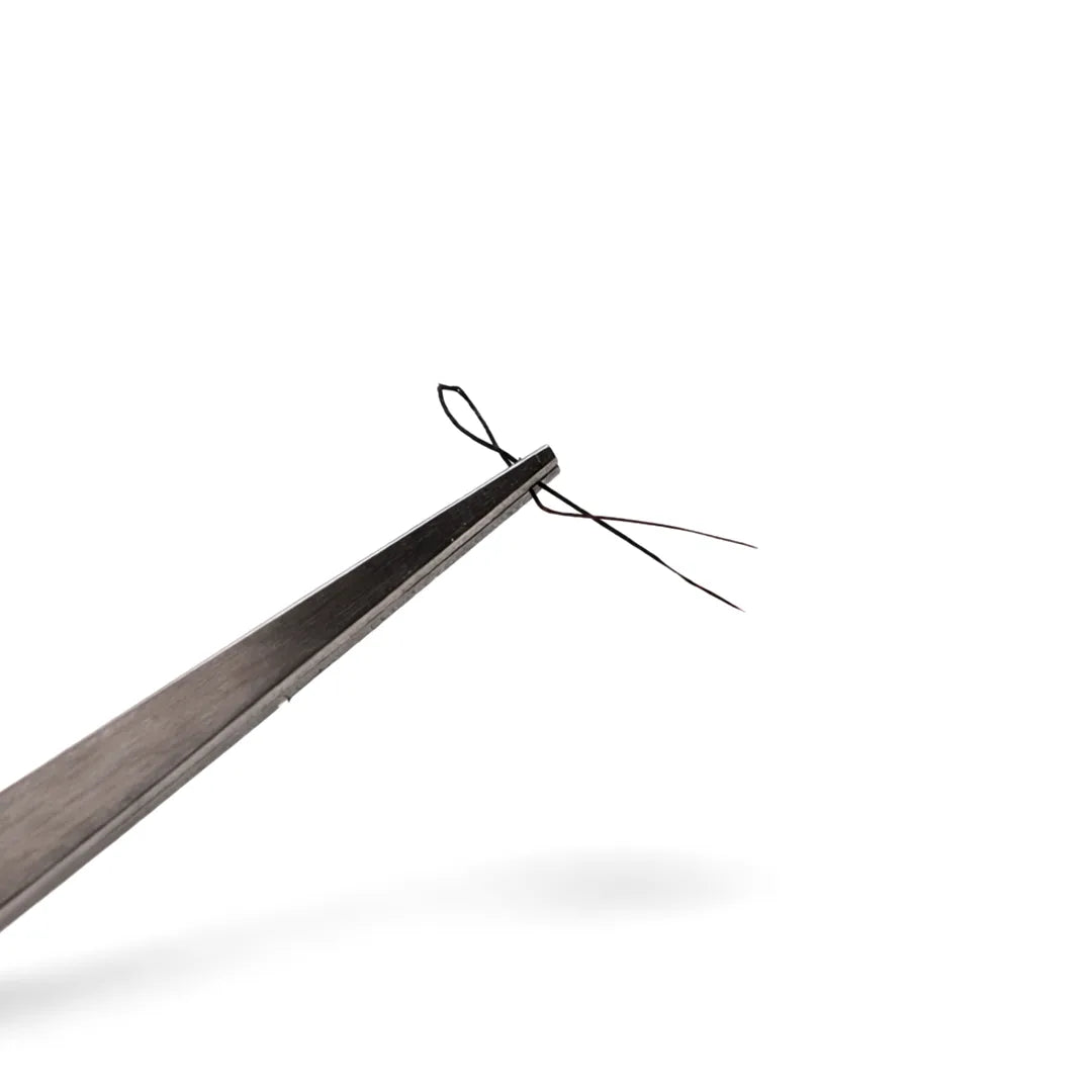 Wooden shoe拔, a tool used for removing shoes, on a white background