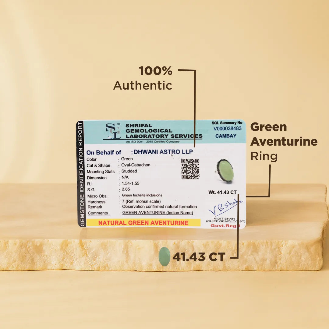 Certified green aventurine ring with laboratory report on a beige background