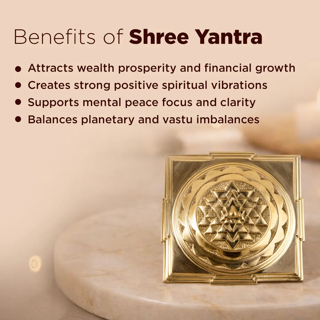 Gold Shree Yantra with text on its benefits on a beige background