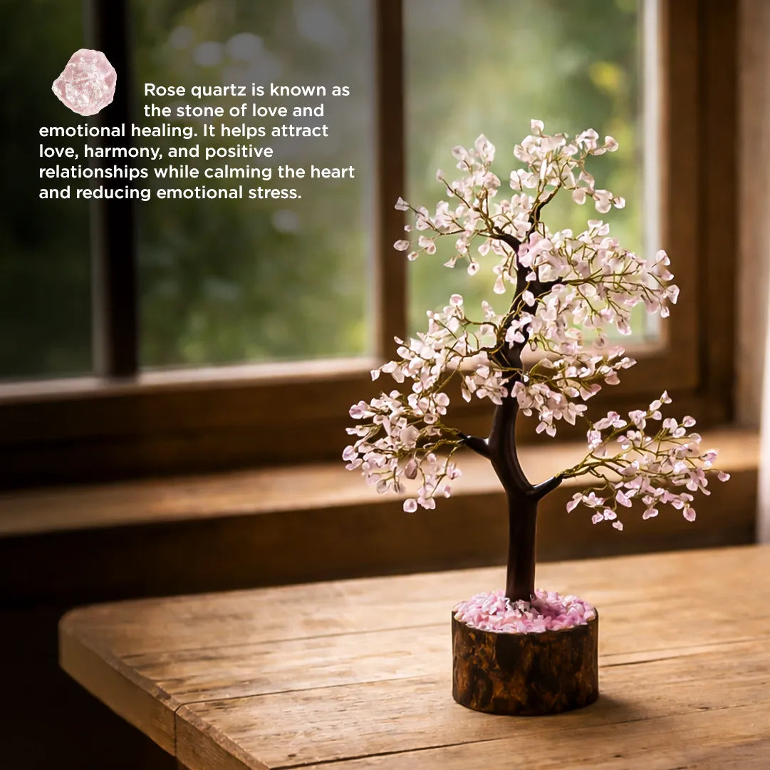 Decorative tree with pink flowers on a wooden surface, featuring text about rose quartz.
