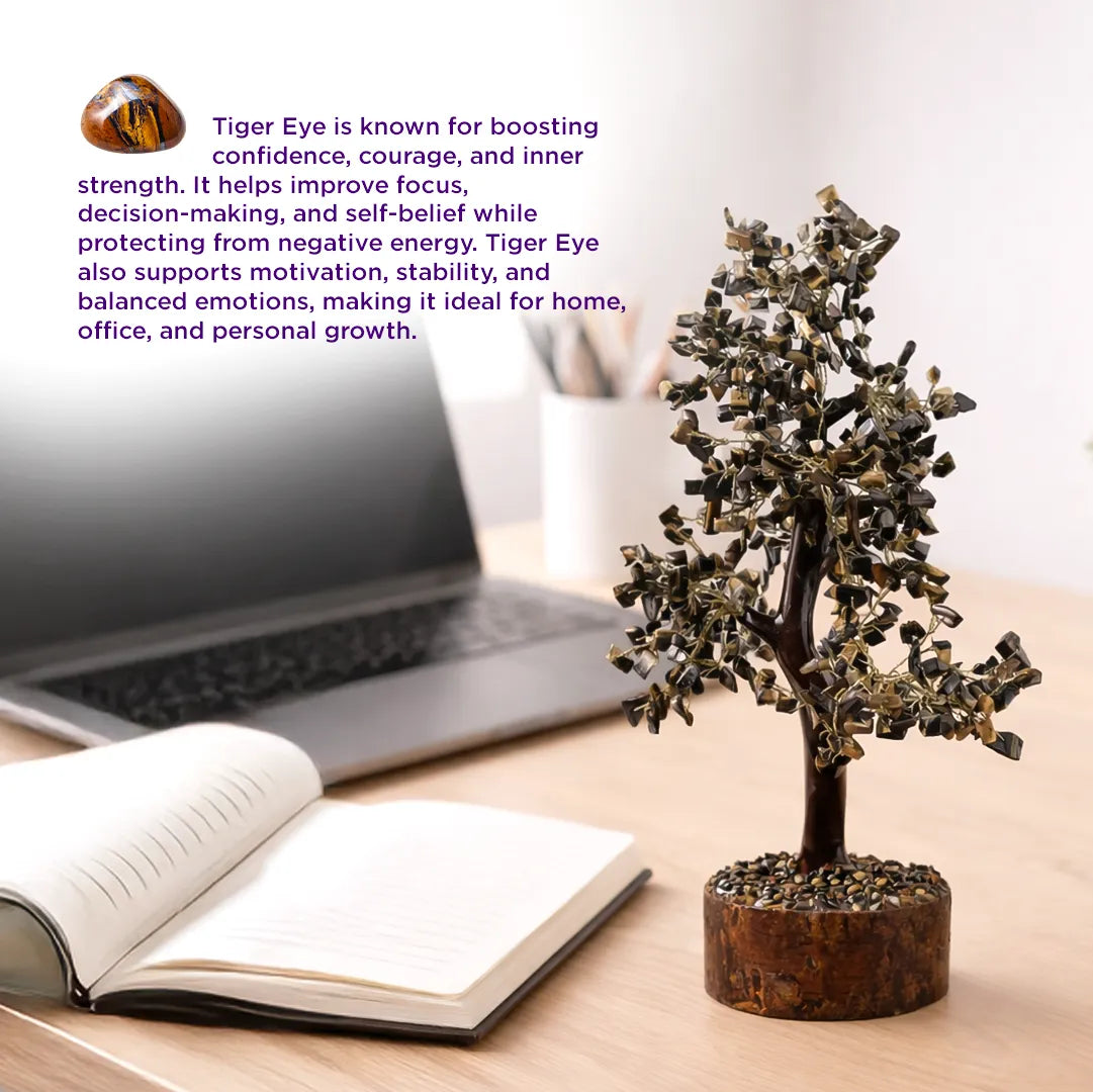 Decorative crystal tree on a desk with laptop and book, Tiger Eye properties text overlayTiger Eye Tree – Abhimantrit Crystal Tree for Confidence, Courage