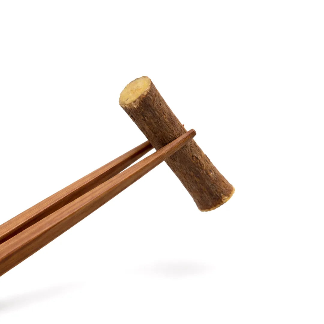 Wooden mallet with a cylindrical head on a white backgroundVidhara Mool Roots – Attraction, Protection & Powerful Spiritual Remedy