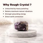 Rough crystal on a marble platform with text explaining benefits