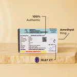 Amethyst ring with a certification label on a beige background