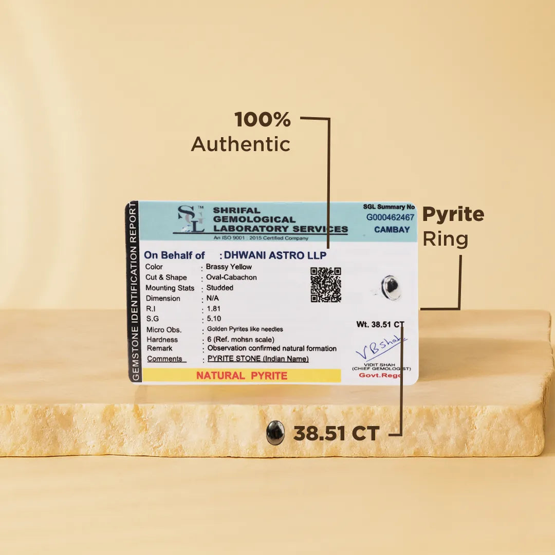 Pyrite ring with certification label on a beige background